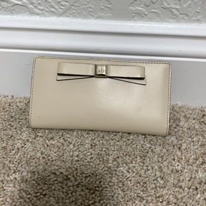 Kate Spade Cream Wallet with Gold Bow Accent